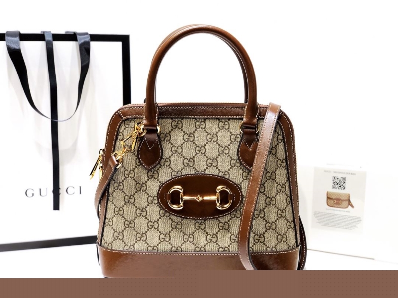 G*u*i top handle bags